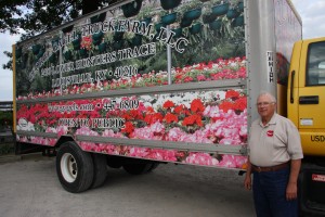 George Gagel with his “traveling billboard,” his delivery truck.