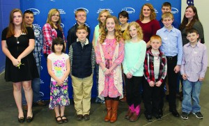 Poster contest winners were, from left: front row – Chloe Teets, 10th grade, Mercer County; Lily Likarich, first grade, Hardin County; Kason Wright, second grade, Monroe County; Lydia Newton, sixth grade, Nelson County; Elizabeth Johnson, fourth grade, Warren County; Benjamin Caldbeck, kindergarten, Daviess County; Phillip Caldbeck, sixth grade, Daviess County; Jordan Hester, third grade, Monroe County; back row – Taylor McCarty, ninth grade, Montgomery County; Cara Storm, eighth grade, Daviess County; Richard Pike, eighth grade, LaRue County; Madison McVey (digital contest winner), ninth grade, Montgomery County; Kaitlyn McNulty, seventh grade, Franklin County; Melanie P'Poole, 11th grade, Lyon County; William Caldbeck, ninth grade, Daviess County; and Emily Jeter, 12th grade, Metcalfe County. Not pictured: Zoe Barker, fifth grade, Daviess County. (Kentucky Department of Agriculture photo)