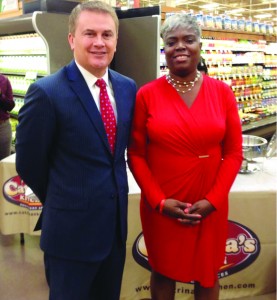 Agriculture Commissioner James Comer chats with Catrina Hill of Louisville, co-founder of Catrina’s Kitchen, at the announcement of the Kentucky Proud-Kroger partnership in November 2014 in Lexington.